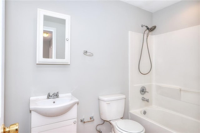 full bathroom featuring toilet, bathtub / shower combination, and vanity