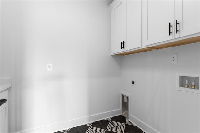 laundry room with washer hookup, cabinets, and hookup for an electric dryer