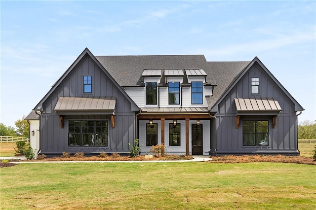 back of house featuring a yard