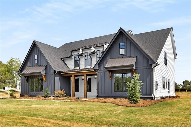 view of front of home with a front yard