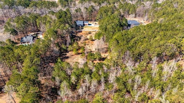 aerial view featuring a forest view