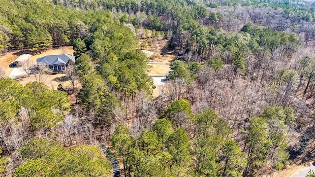 aerial view with a wooded view