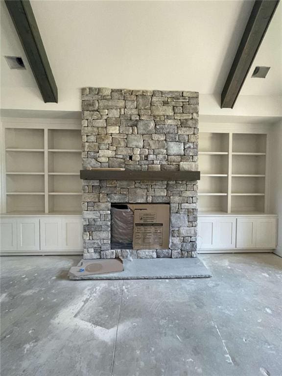 1210 Askew Trl, Greensboro, GA 30642 - unfurnished living room featuring beam ceiling, visible vents, concrete flooring, and a stone fireplace