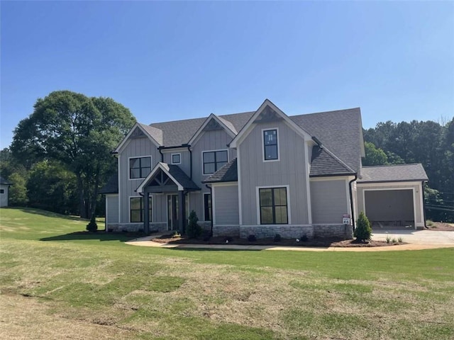 1210 Askew Trl, Greensboro, GA 30642 - craftsman-style home with an attached garage, driveway, board and batten siding, a front lawn, and roof with shingles