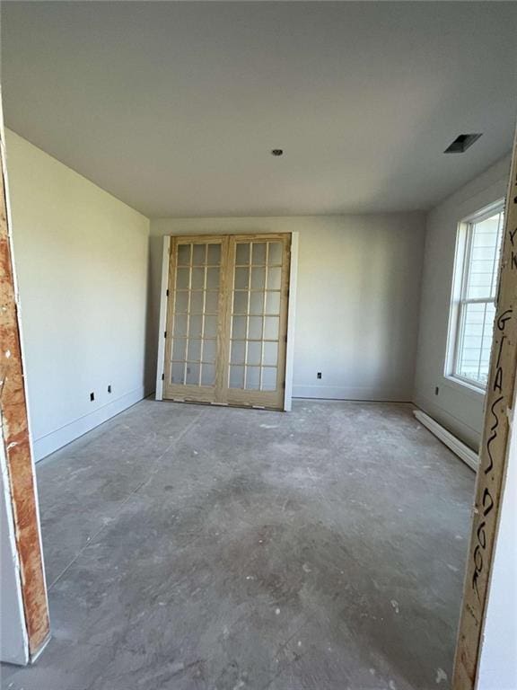 1210 Askew Trl, Greensboro, GA 30642 - unfurnished room featuring unfinished concrete floors and baseboards