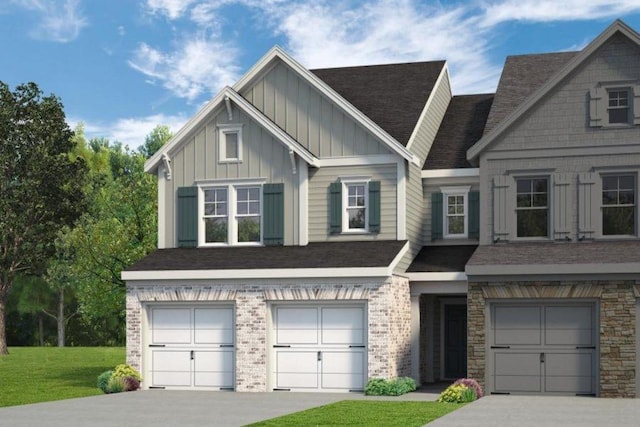 view of front facade with a garage, a front yard, board and batten siding, and concrete driveway