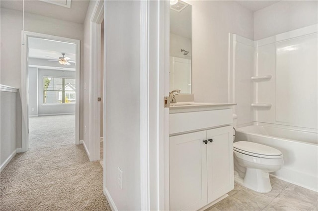 full bath with vanity, baseboards, toilet, shower / bathtub combination, and visible vents