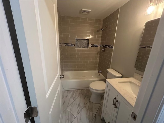 5090 Lorraine Pl, Forest Park, GA 30297 - bathroom with vanity, toilet,  shower combination, and marble finish flooring