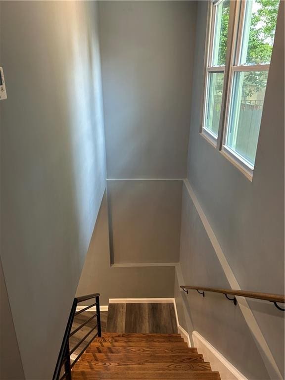 5090 Lorraine Pl, Forest Park, GA 30297 - staircase featuring wood finished floors