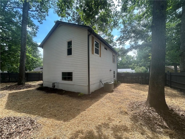 5090 Lorraine Pl, Forest Park, GA 30297 - back of property with a fenced backyard and central AC