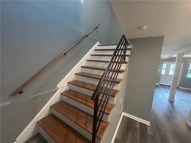 5090 Lorraine Pl, Forest Park, GA 30297 - staircase with wood finished floors, baseboards, and ornate columns