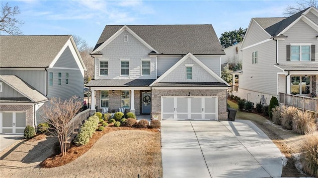 craftsman-style home featuring a garage and a porch