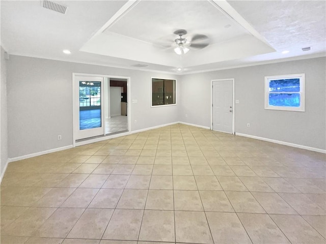 2492 Wild Rose Cir, Lawrenceville, GA 30044 - empty room with a tray ceiling, a ceiling fan, light tile patterned floors, and recessed lighting