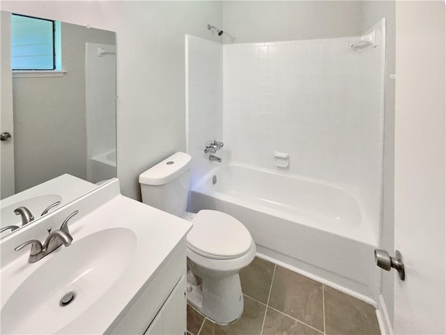2492 Wild Rose Cir, Lawrenceville, GA 30044 - bathroom featuring shower / bath combination, toilet, vanity, and tile patterned floors