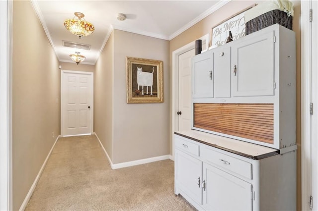 corridor featuring light carpet and ornamental molding