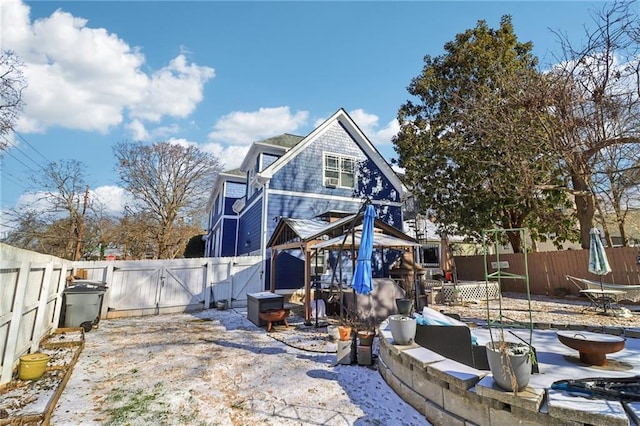 back of house featuring a patio