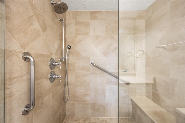 full bathroom featuring tiled shower