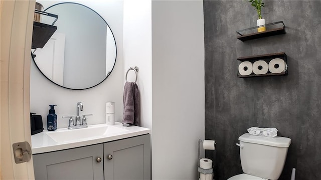 114 Garrison Dr, Winder, GA 30680 - half bathroom featuring toilet and vanity