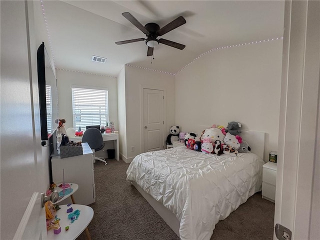 114 Garrison Dr, Winder, GA 30680 - bedroom with carpet flooring, an office area, vaulted ceiling, and a ceiling fan