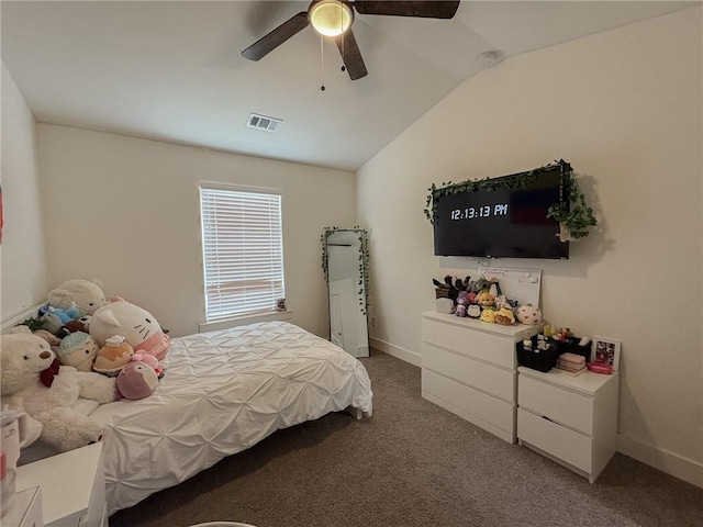114 Garrison Dr, Winder, GA 30680 - carpeted bedroom with lofted ceiling and a ceiling fan