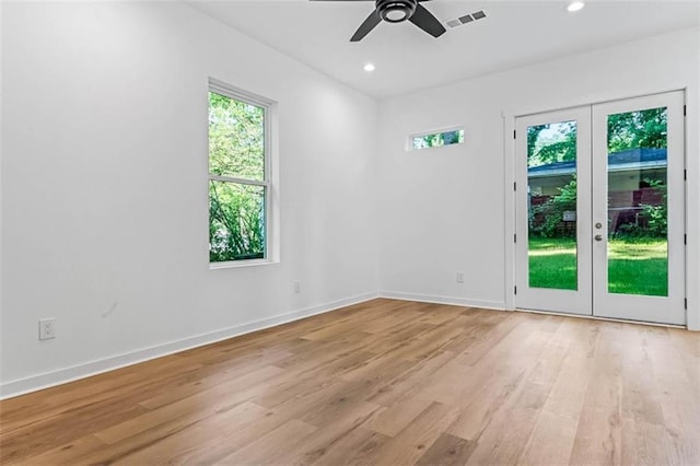 1835 Taylor Ave, East Point, GA 30344 - spare room featuring french doors, light wood finished floors, a ceiling fan, and recessed lighting