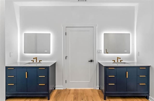 1835 Taylor Ave, East Point, GA 30344 - full bathroom with two vanities and wood finished floors