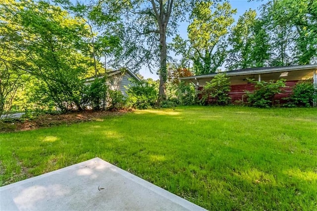 1835 Taylor Ave, East Point, GA 30344 - view of green lawn with a patio area