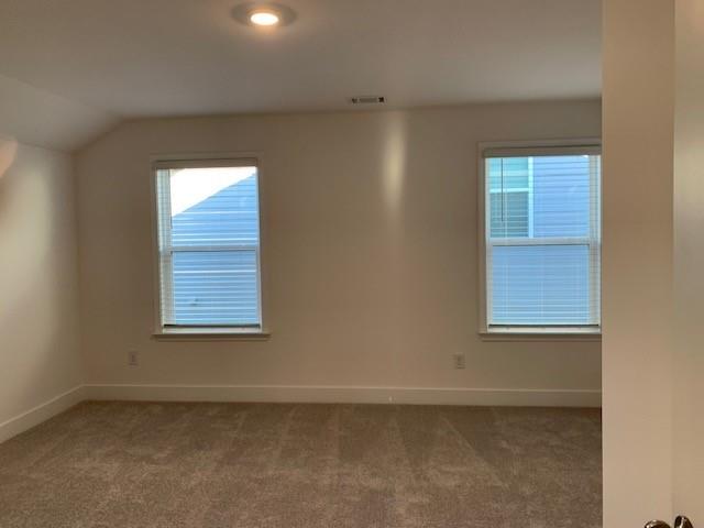 entrance foyer with crown molding and dark hardwood / wood-style flooring