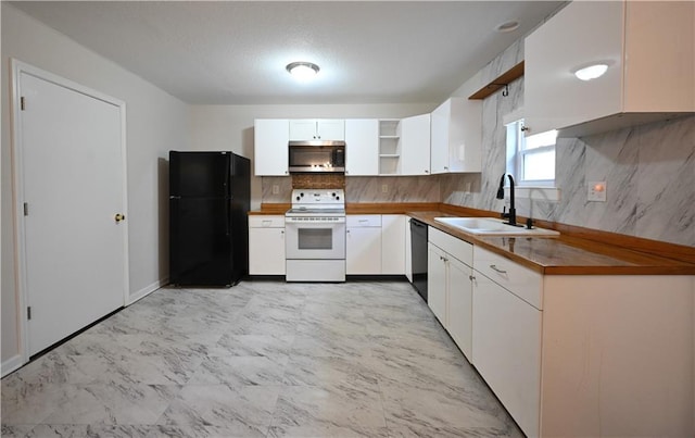 kitchen with white cabinets, sink, tasteful backsplash, and black appliances