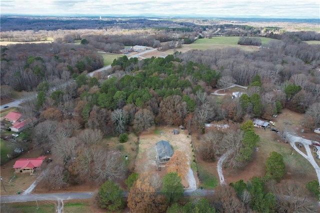 aerial view featuring a view of trees