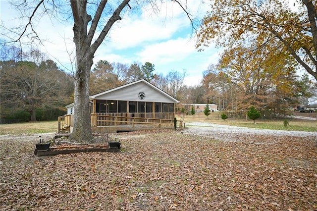 view of front facade featuring a sunroom