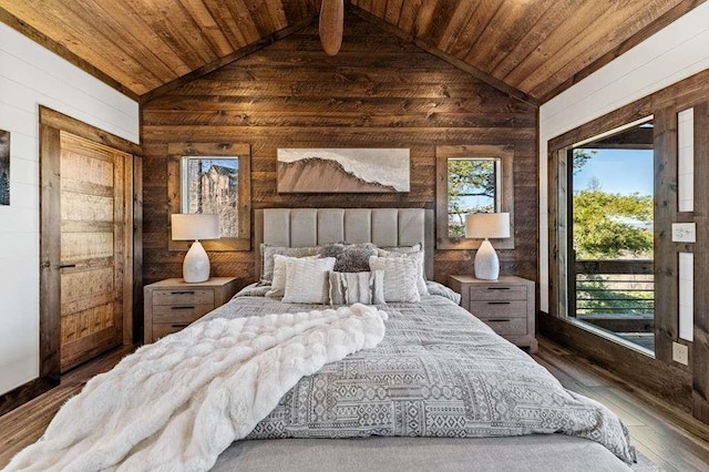 bedroom featuring lofted ceiling, wooden ceiling, and access to exterior