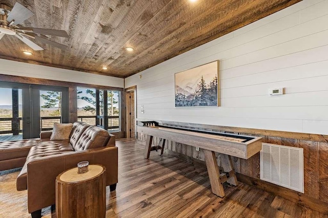 rec room with hardwood / wood-style floors, wooden ceiling, and ceiling fan