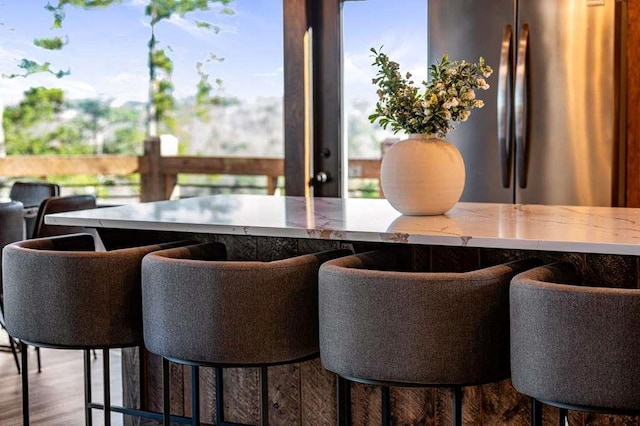 dining space featuring wood-type flooring