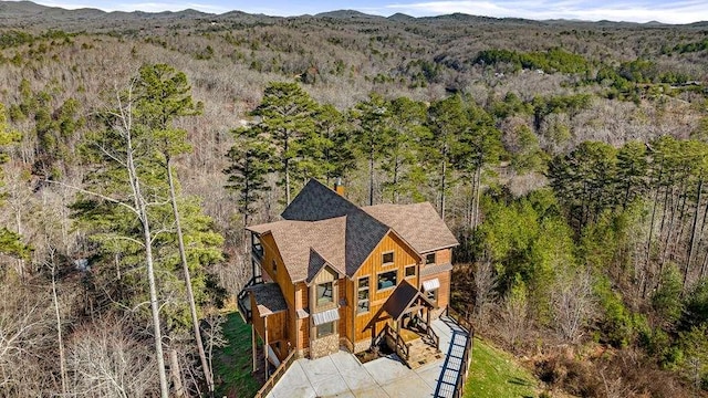 birds eye view of property featuring a mountain view