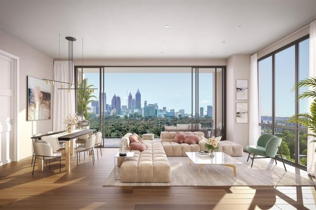 living room featuring a healthy amount of sunlight and hardwood / wood-style floors