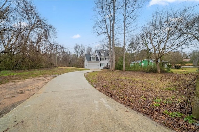 view of road featuring driveway