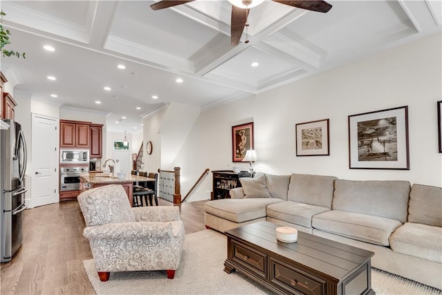 living room with beamed ceiling, crown molding, coffered ceiling, and wood-type flooring