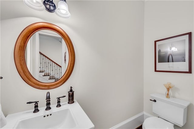 bathroom with sink and toilet