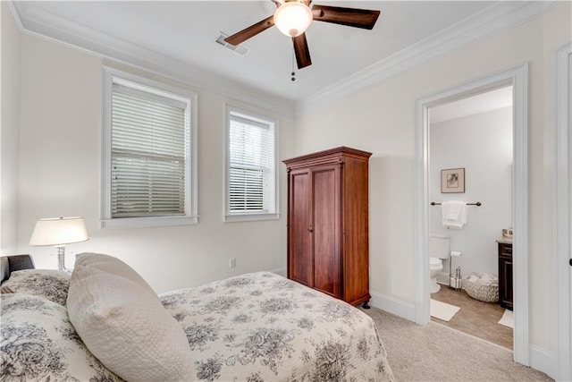 bedroom featuring crown molding, light carpet, ensuite bathroom, and ceiling fan