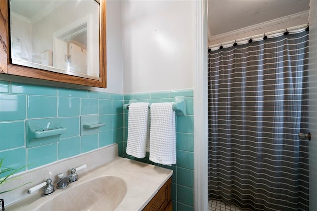 bathroom with ornamental molding, vanity, tile walls, and a shower with curtain