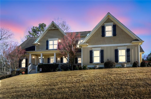 103 Old Avery Dr, Canton, GA 30115 - view of front of home with board and batten siding, a porch, and a yard