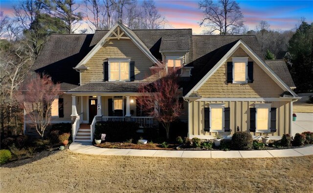 103 Old Avery Dr, Canton, GA 30115 - craftsman-style home with a porch, a front lawn, and board and batten siding