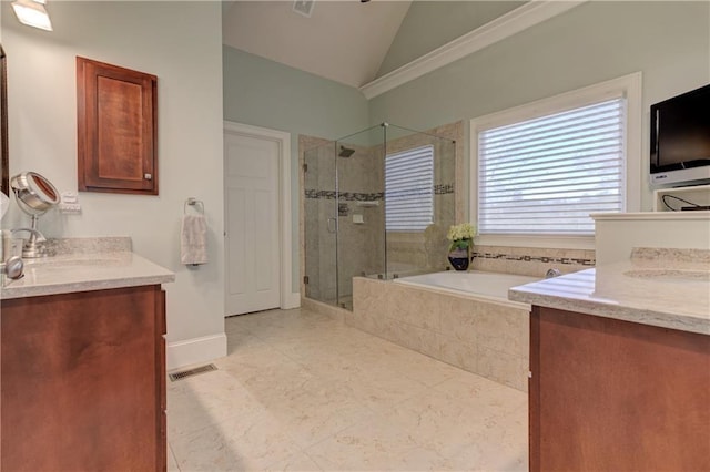 103 Old Avery Dr, Canton, GA 30115 - full bathroom featuring a shower stall, a garden tub, two vanities, lofted ceiling, and tile patterned floors