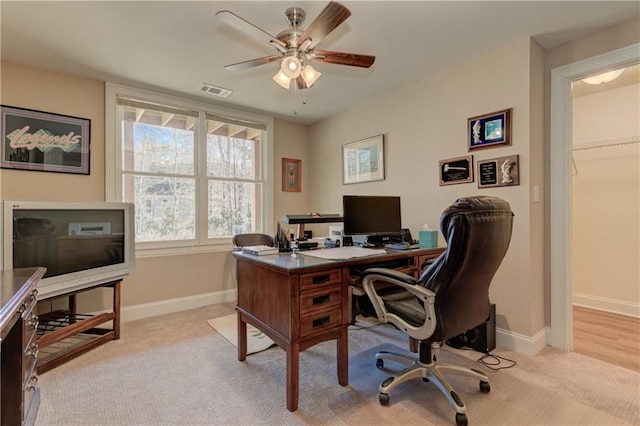 103 Old Avery Dr, Canton, GA 30115 - home office with light carpet, a ceiling fan, and baseboards
