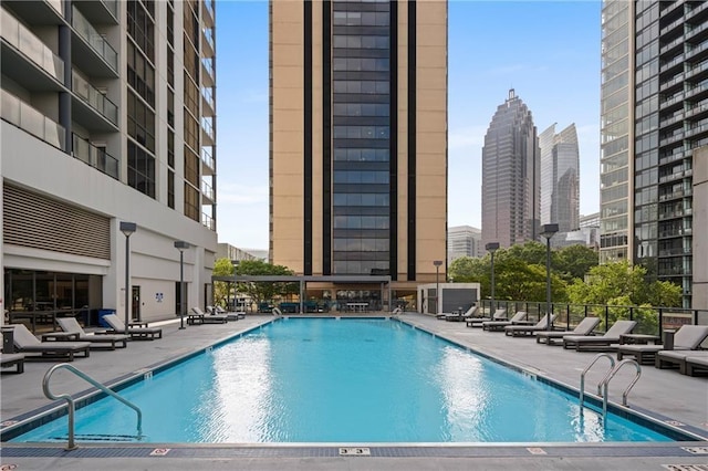 view of pool featuring a patio