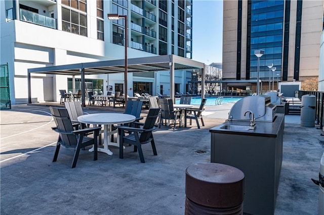 view of patio / terrace with a community pool