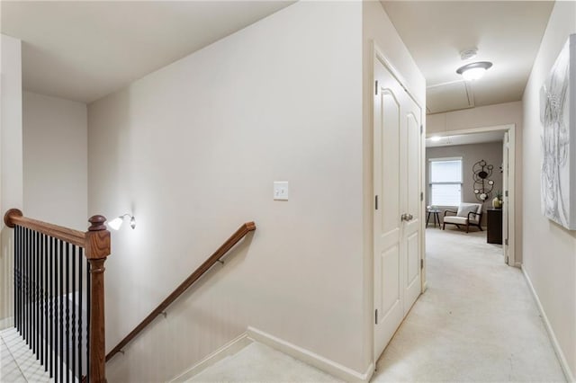 corridor with light colored carpet