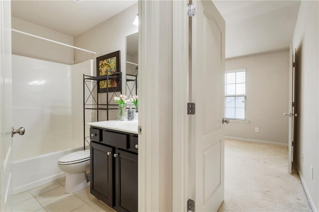 full bathroom featuring tile patterned floors, vanity, bathing tub / shower combination, and toilet