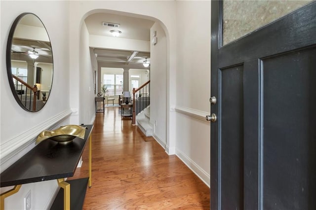 foyer featuring beamed ceiling, ceiling fan, hardwood / wood-style flooring, and coffered ceiling